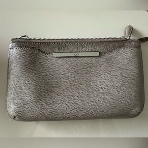 Tumi crossbody with adjustable strap